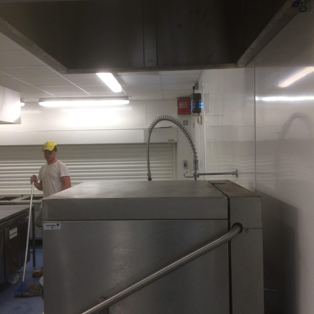 Commercial kitchen with wall cladding